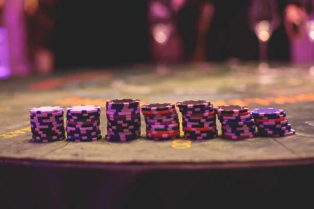 Starburst game loaded on mobile phone showing reels and betting controls